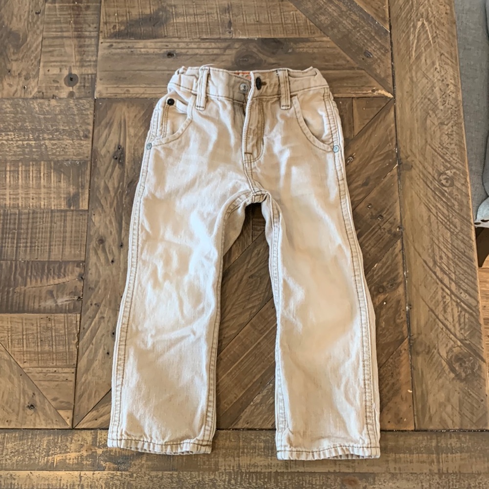 Boys tan jeans.